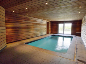  Comfortable chalet with indoor pool hammam and sauna near Stoumont  Стумон